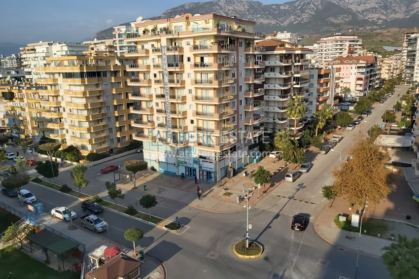 Приобрести Квартира в Махмутларе с мебелью, видом на море и горы, на центральной улице 20 