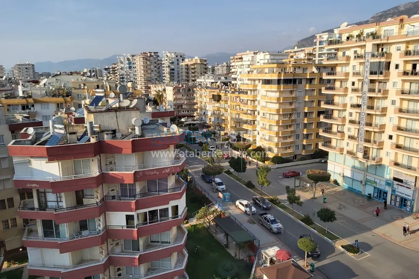 Приобрести Квартира в Махмутларе с мебелью, видом на море и горы, на центральной улице 21 