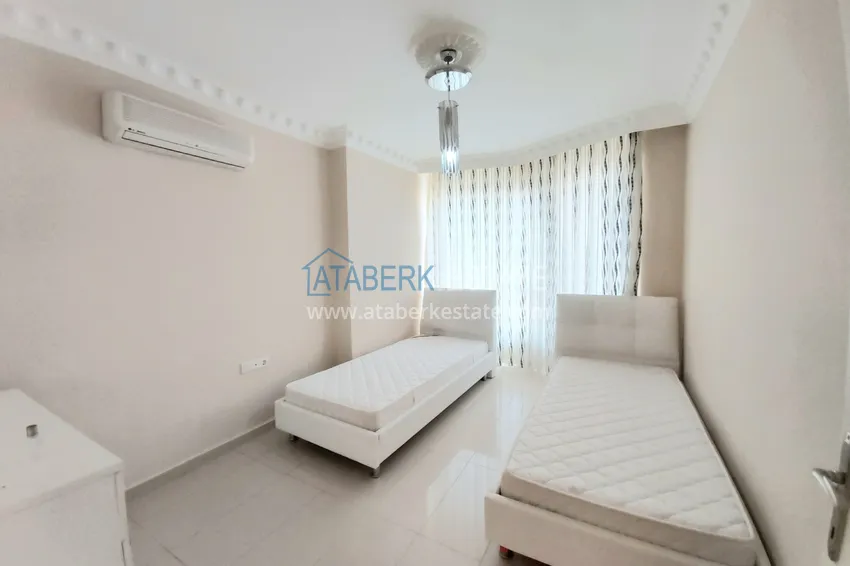 Приобрести Квартира в Махмутларе с мебелью, видом на море и горы, на центральной улице 22 