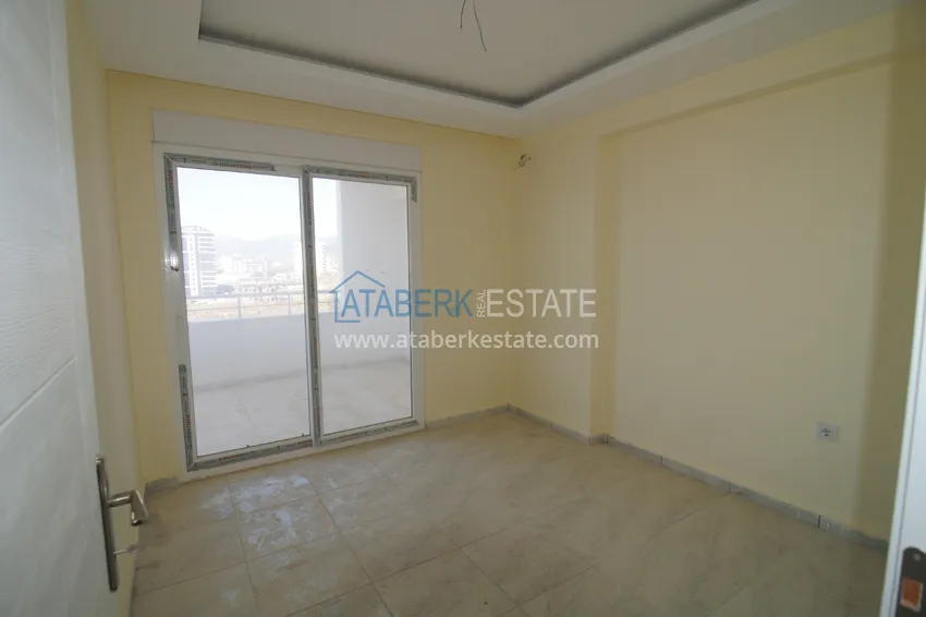 Приобрести Квартира в Махмутларе трехкомнатная с отдельной кухней 7 