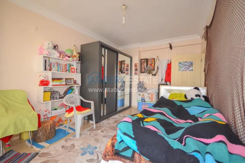 Приобрести Квартира в Махмутларе, трехкомнатная рядом с морем 18 