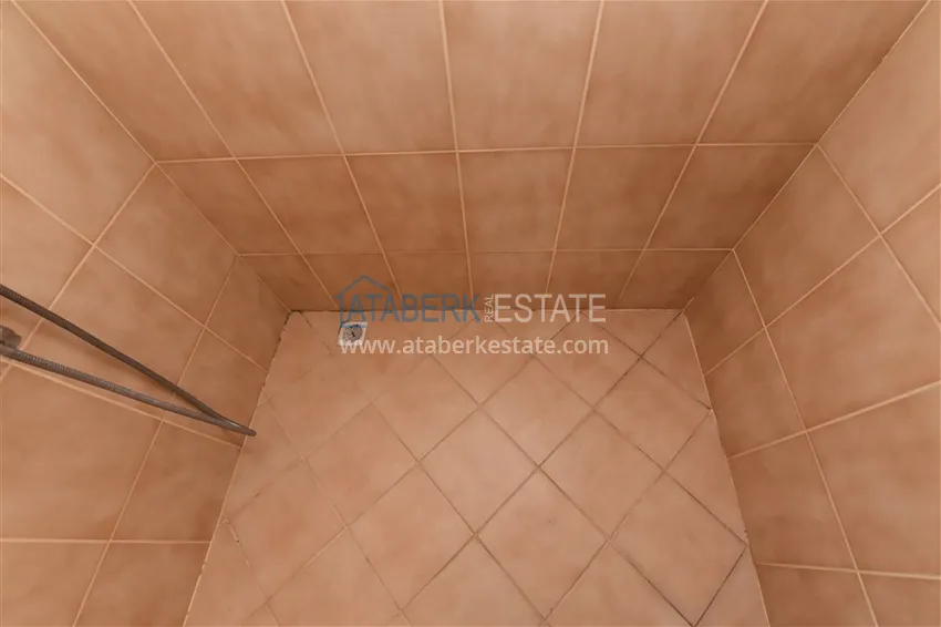 Приобрести Квартира в центре Алании с мебелью, отдельной кухней и застекленными балконами 33 