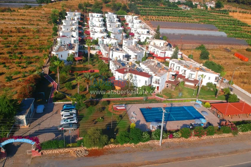 Таунхаус в районе Демирташ с мебелью, садом и видом на море  2 