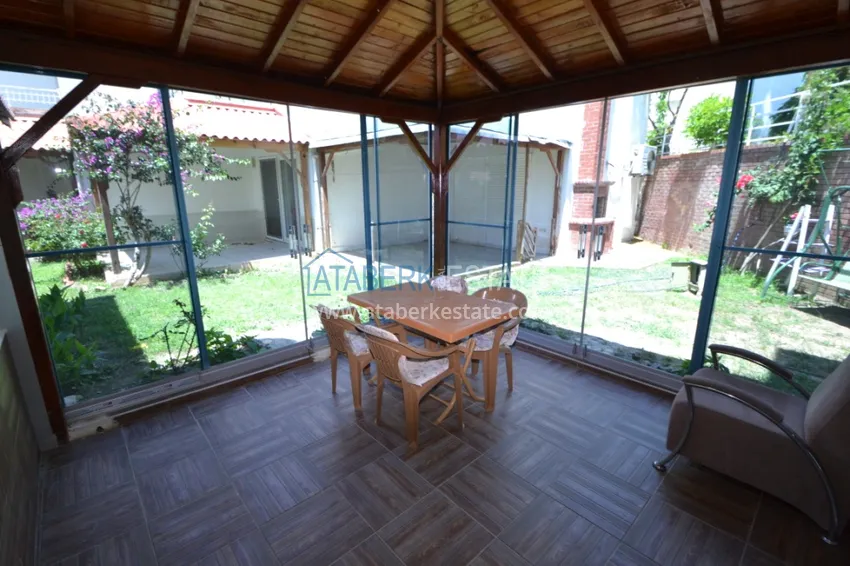 Приобрести Таунхаус в районе Демирташ с мебелью, садом и видом на море  4 