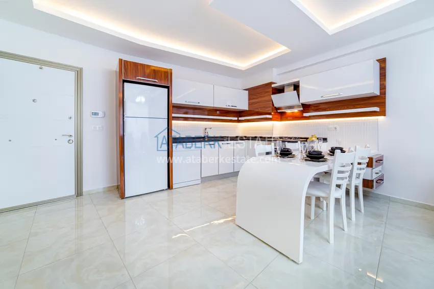 Приобрести Квартира в Махмутларе современный интерьер, вид на горы, комфортабельном комплекс  4 