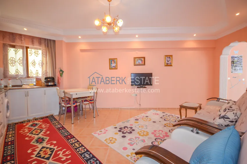 Приобрести Квартира в Махмутларе двухкомнатная с мебелью, в жилом комплексе 4 