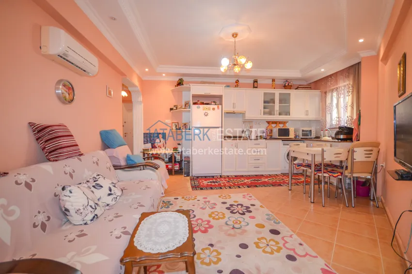 Приобрести Квартира в Махмутларе двухкомнатная с мебелью, в жилом комплексе 5 