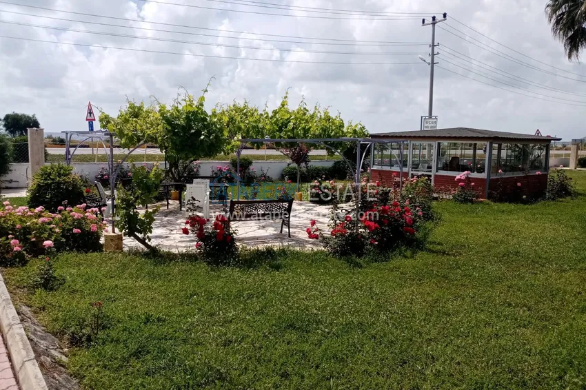 Таунхаус в районе Демирташ с мебелью, садом и видом на море  7 