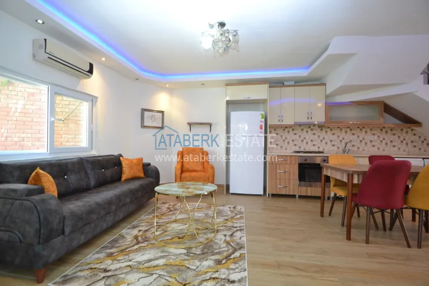 Приобрести Таунхаус в районе Демирташ с мебелью, садом и видом на море  7 