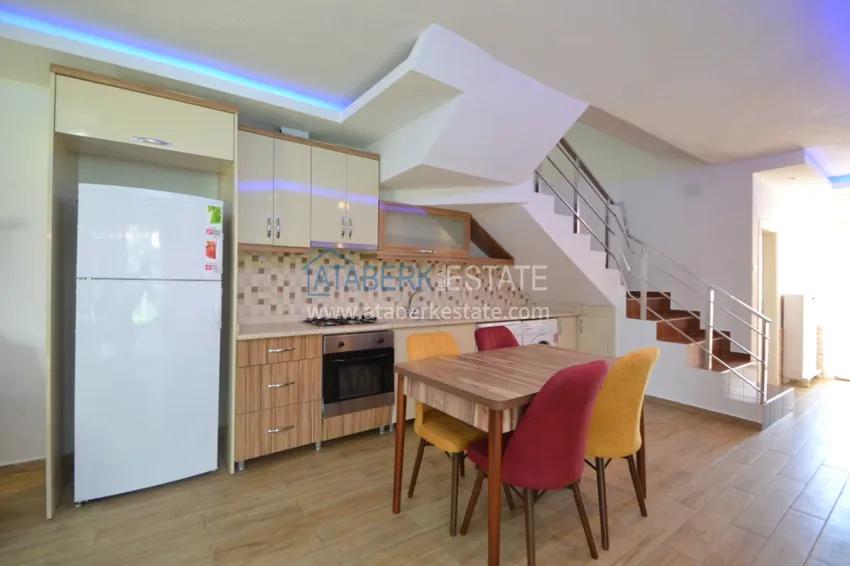 Приобрести Таунхаус в районе Демирташ с мебелью, садом и видом на море  8 