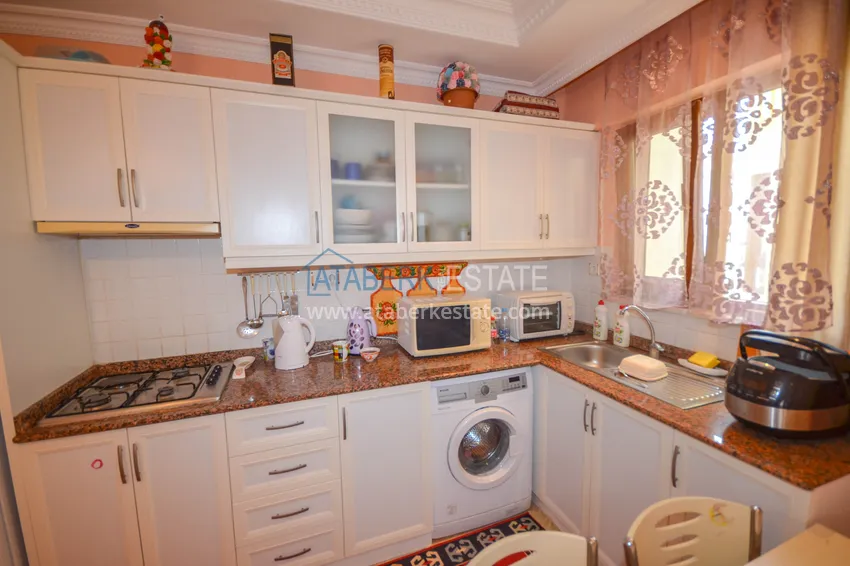 Приобрести Квартира в Махмутларе двухкомнатная с мебелью, в жилом комплексе 7 