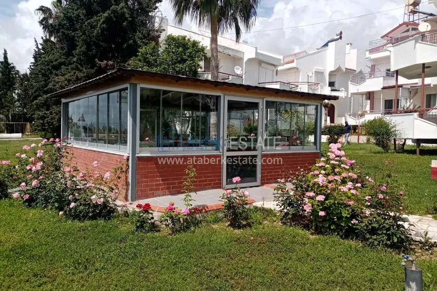 Таунхаус в районе Демирташ с мебелью, садом и видом на море  8 