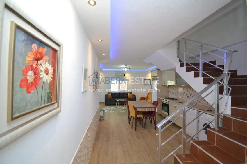 Приобрести Таунхаус в районе Демирташ с мебелью, садом и видом на море  9 