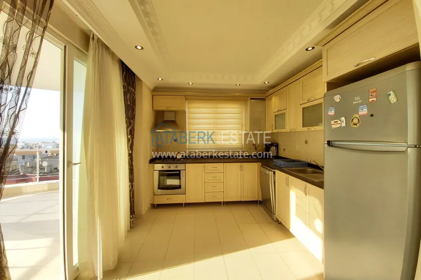 Приобрести Квартира в Махмутларе с мебелью, видом на море и горы, на центральной улице 9 