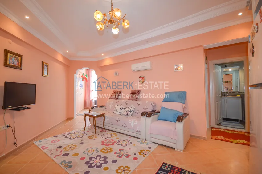 Приобрести Квартира в Махмутларе двухкомнатная с мебелью, в жилом комплексе 8 