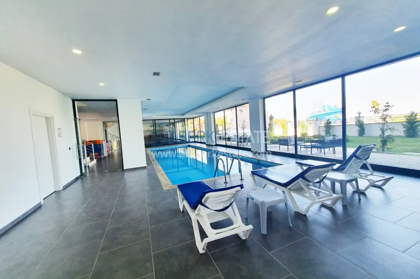 Квартира в Махмутларе с чистовой отделкой в благоустроенном комплексе 10 