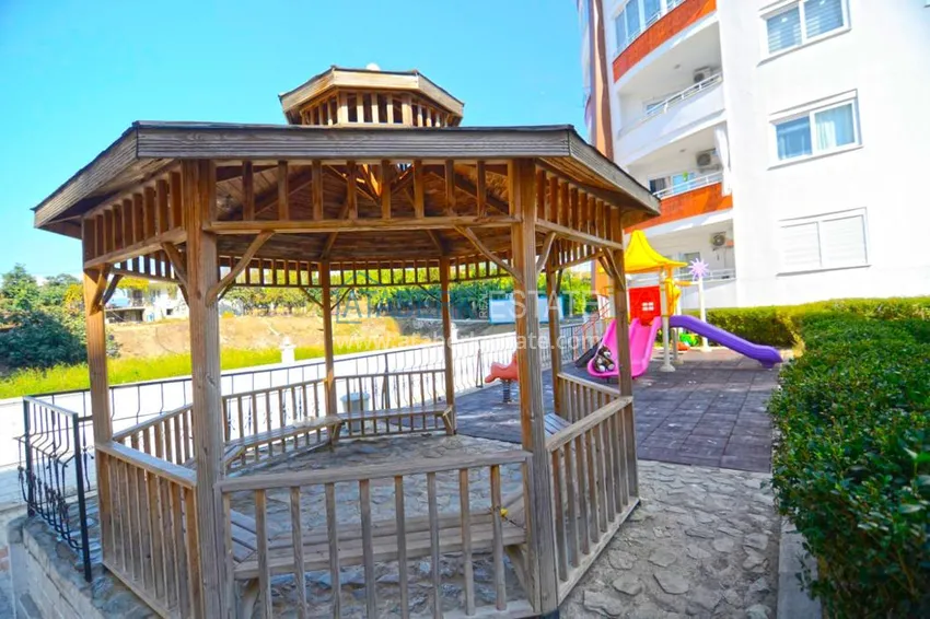 Квартира в Махмутларе трехкомнатная с отдельной кухней 9 