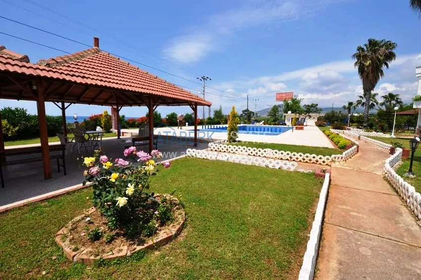 Таунхаус в районе Демирташ с мебелью, садом и видом на море  9 