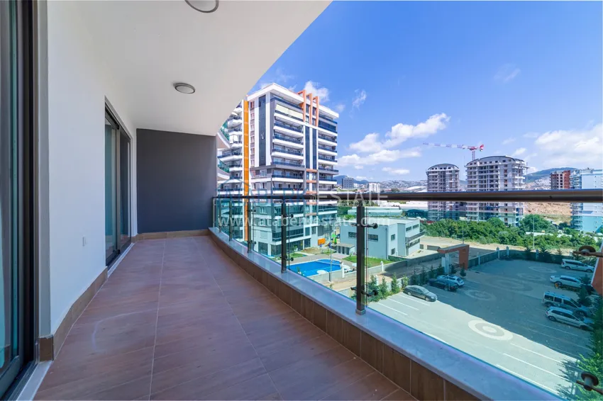 Приобрести Квартира в Махмутларе современный интерьер, вид на горы, комфортабельном комплекс  9 