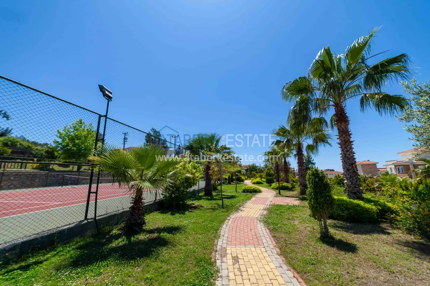 Вилла в Авсалларе трехэтажный таунхаус на два хозяина с частным садиком  9 