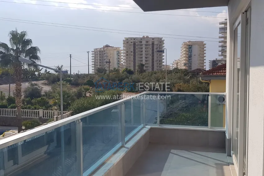 Приобрести Квартира в Махмутларе с чистовой отделкой в благоустроенном комплексе 9 