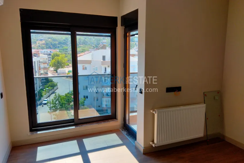 Приобрести Квартира в Анталии район Коньяалты с видом на горы от застройщика  11 