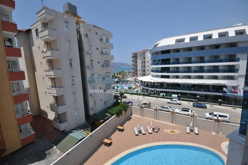 Приобрести Квартира в Тосмуре меблированная с частичным видом на море в уютном комплексе 11 