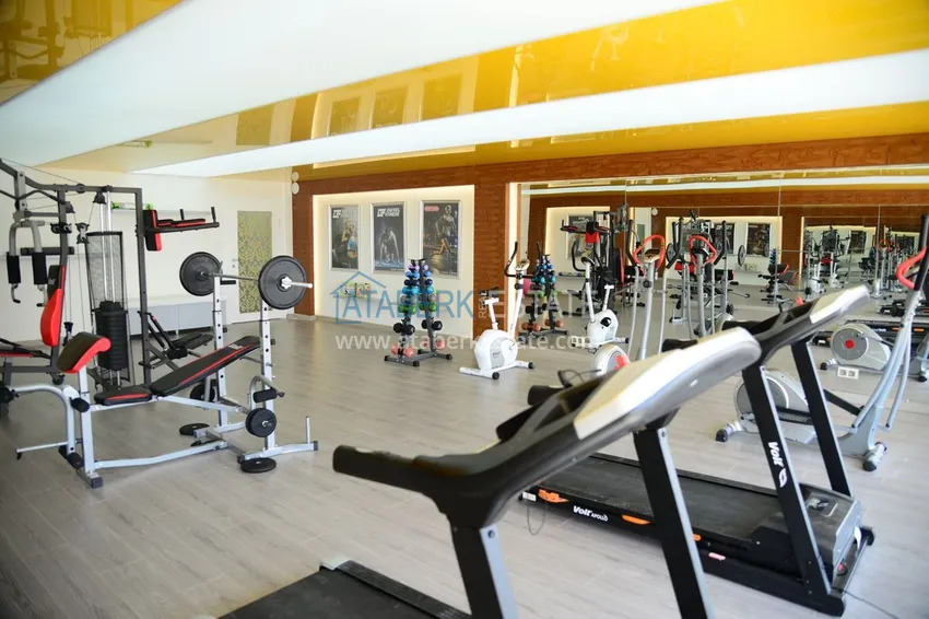 Квартира в Махмутларе с мебелью видом на горы в комплексе с частным пляжем  14 