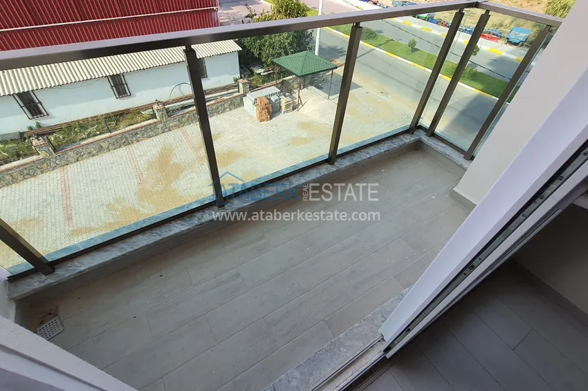 Приобрести Квартира в Конаклы с чистовой отделкой, отдельной кухней в новом комплексе  12 