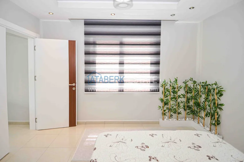 Приобрести Квартира в Махмутларе с 2 спальнями, мебелью и открытым видом 15 