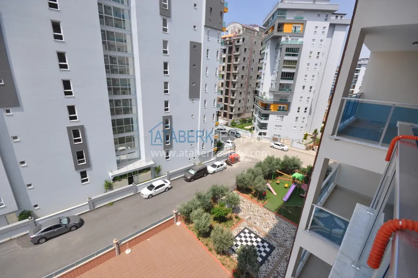 Приобрести Квартира в Махмутларе с мебелью видом на горы в комплексе с частным пляжем  18 