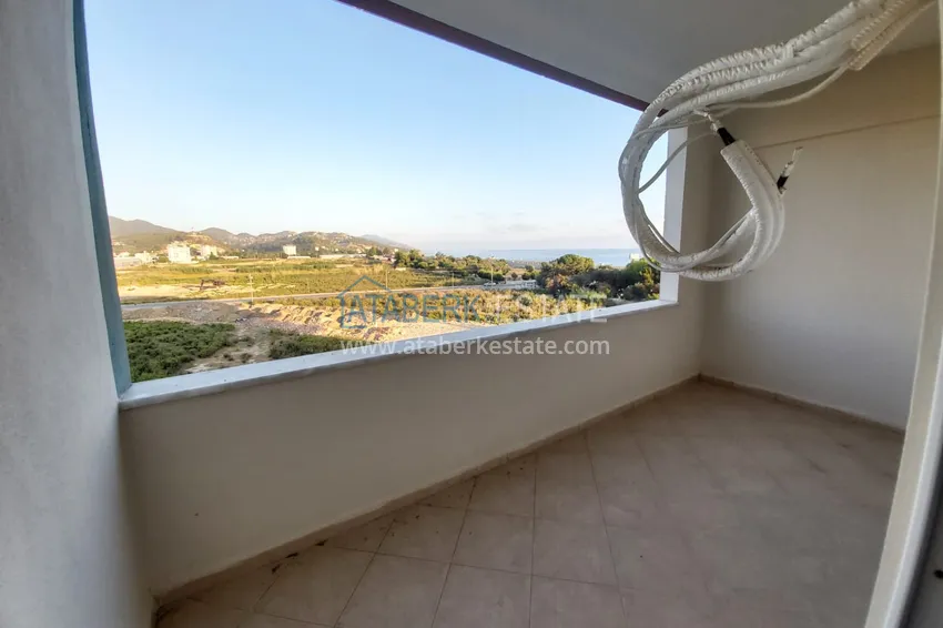 Приобрести Квартира в районе Демирташ с видом на море в жилом комплексе  21 