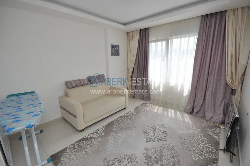 Приобрести Квартира в Махмутларе с мебелью видом на горы в комплексе с частным пляжем  20 