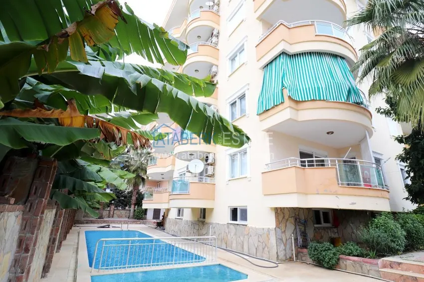 Квартира в Махмутларе с 2 спальнями в комплексе рядом с морем 1 