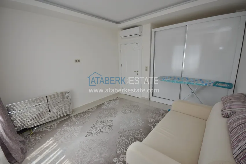 Приобрести Квартира в Махмутларе с мебелью видом на горы в комплексе с частным пляжем  21 