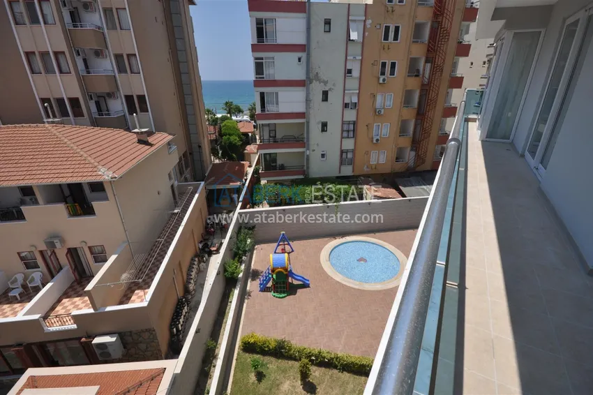 Приобрести Квартира в Тосмуре меблированная с частичным видом на море в уютном комплексе 24 