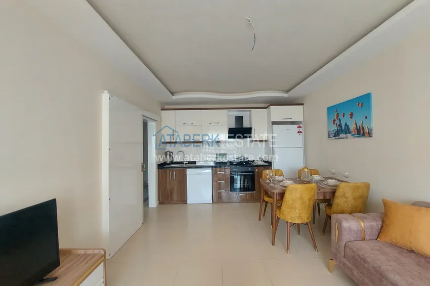 Приобрести Квартира в Махмутларе двухкомнатная с мебелью рядом с морем  3 