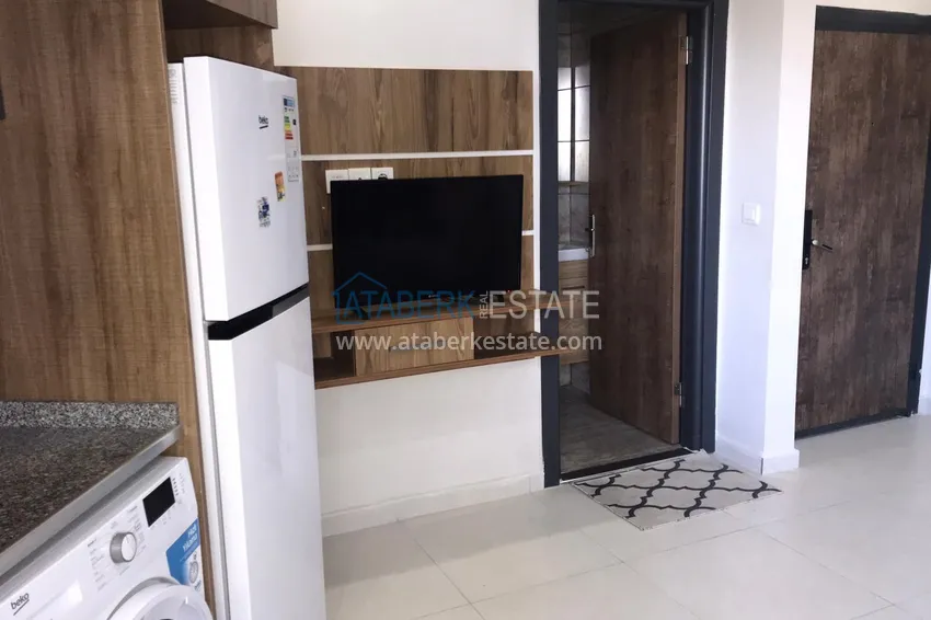 Приобрести Квартира в Махмутларе полностью меблированная в новостройке 4 