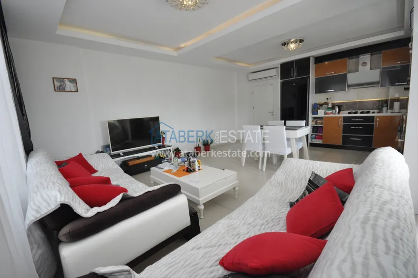 Приобрести Квартира в Махмутларе с мебелью видом на горы в комплексе с частным пляжем  3 