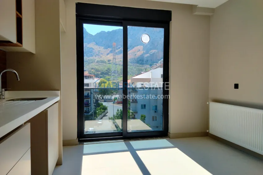 Приобрести Квартира в Анталии район Коньяалты с видом на горы от застройщика  4 