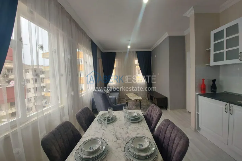 Приобрести Квартира в жилом комплексе в Махмутларе с мебелью 4 