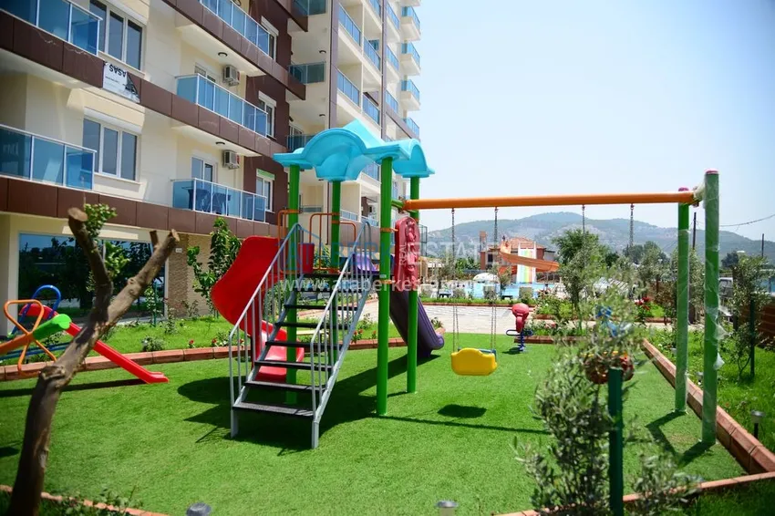 Квартира в Махмутларе с мебелью видом на горы в комплексе с частным пляжем  6 