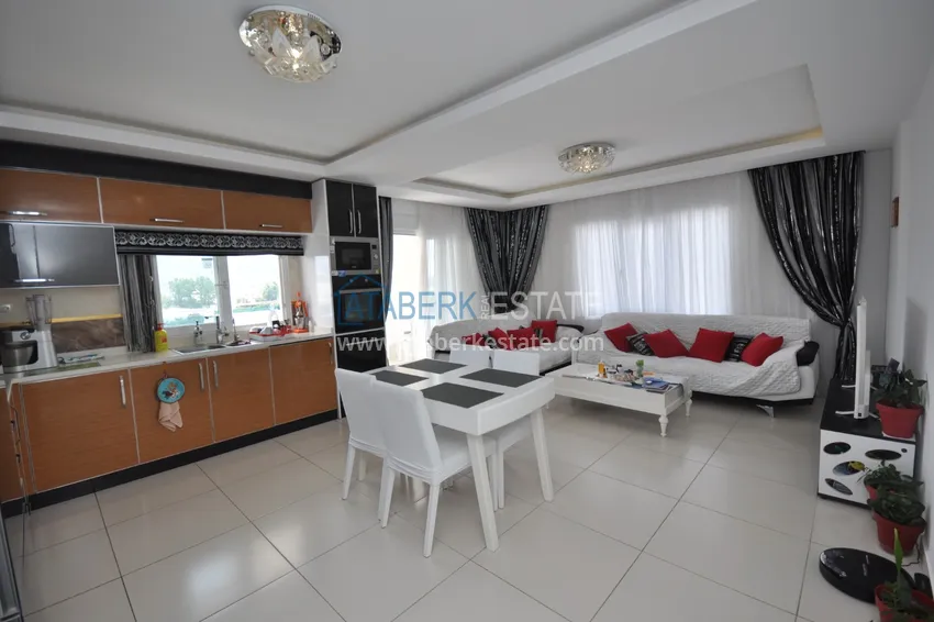 Приобрести Квартира в Махмутларе с мебелью видом на горы в комплексе с частным пляжем  7 