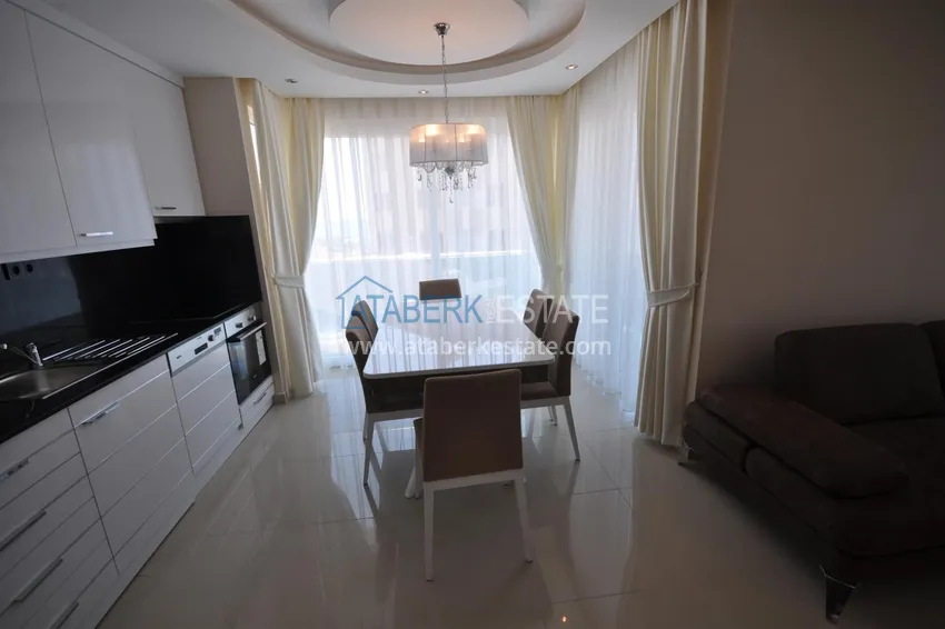 Приобрести Квартира в Тосмуре меблированная с частичным видом на море в уютном комплексе 7 