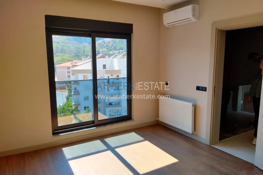 Приобрести Квартира в Анталии район Коньяалты с видом на горы от застройщика  8 