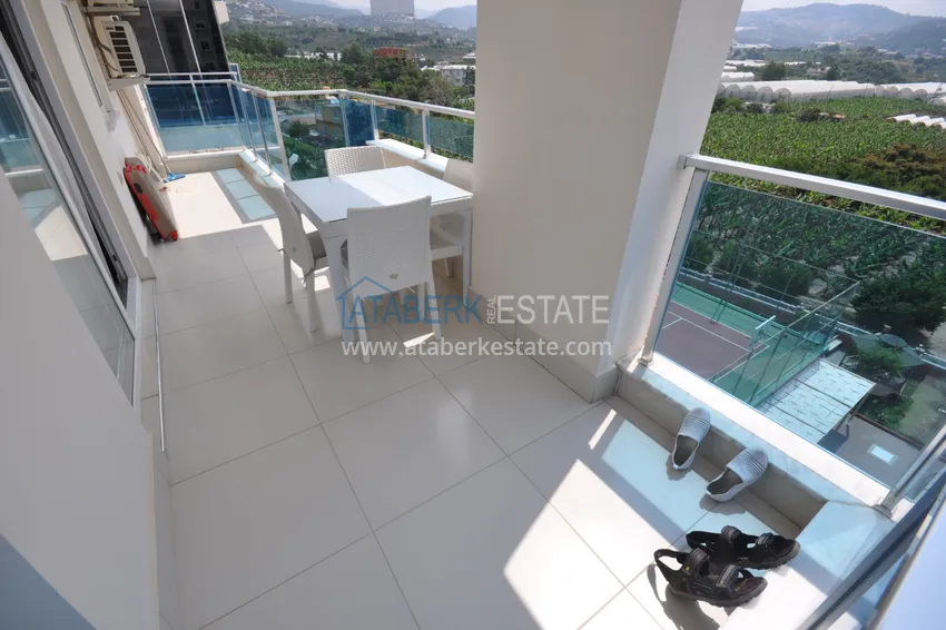 Приобрести Квартира в Махмутларе с мебелью видом на горы в комплексе с частным пляжем  9 