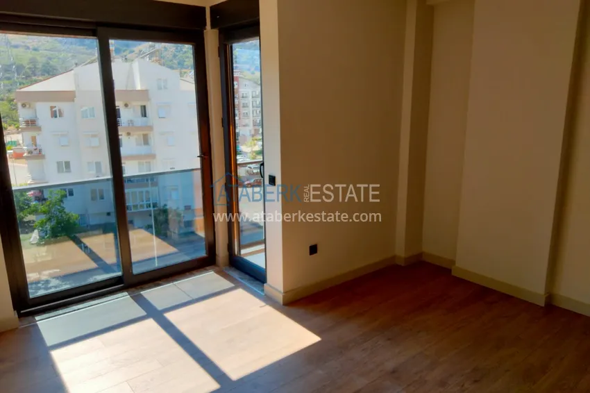 Приобрести Квартира в Анталии район Коньяалты с видом на горы от застройщика  9 