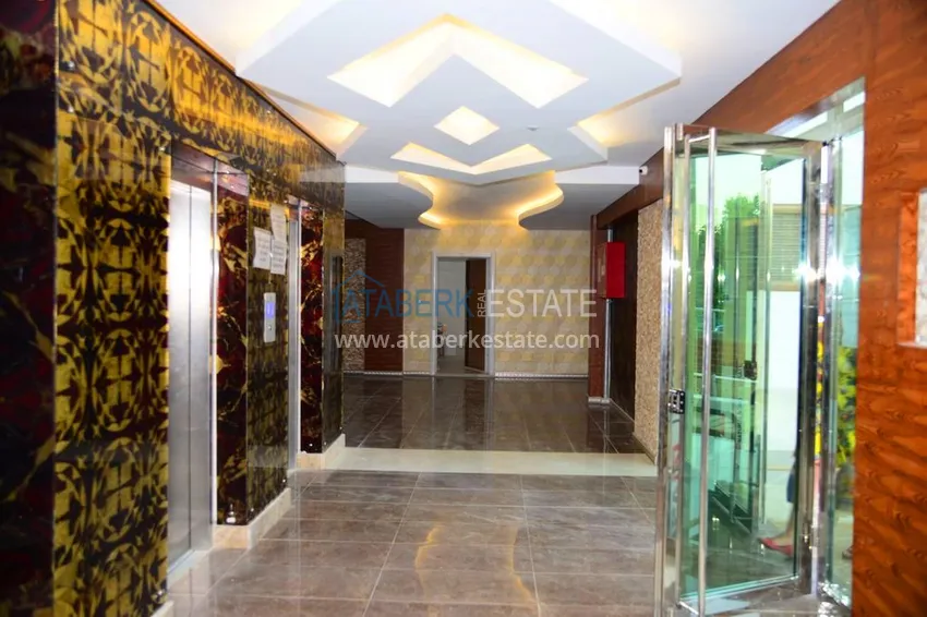 Квартира в Махмутларе с мебелью видом на горы в комплексе с частным пляжем  10 