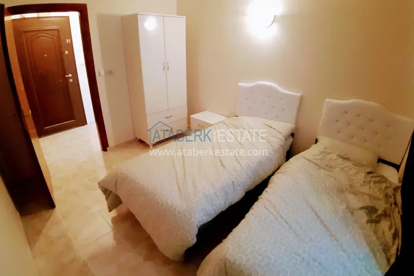 Приобрести Квартира в Махмутларе с мебелью в жилом комплексе рядом с морем 11 