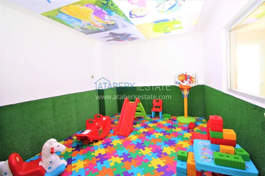 Квартира в Махмутларе с мебелью, застекленным балконом в благоустроенной резиденции 19 